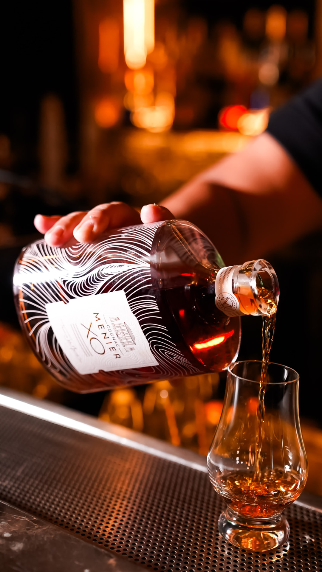 Behind the bar.